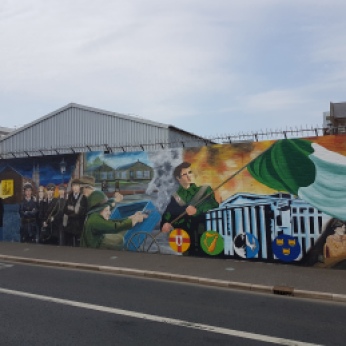 The walls of Belfast are covered with grafitti related to the decade-long conflict they call " the troubles,"