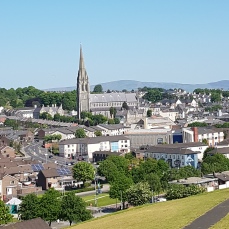Below the walls is the bogside, 97 percent Catholic, with its cathedral in the background.