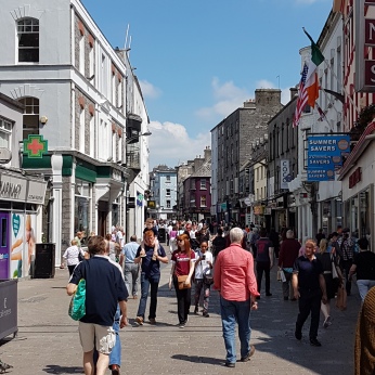 The streets of Galway were crowded with tourists.