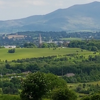 Killarney town and its church spire are seen in the distance.