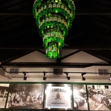 Love the chandelier made with whiskey bottles.